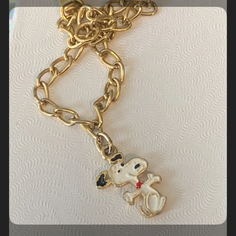 United features vintage gold tone 6” snoopy bracelet